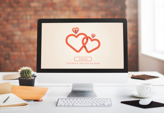 Apple computer showing a wedding website